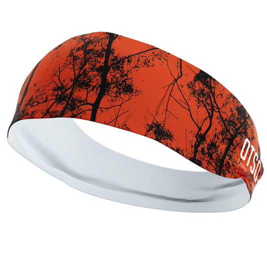 Headband Otso de 12 centímetros de grosor y estampado de árboles de color negro sobre fondo rojo. El producto es unisex y de talla única